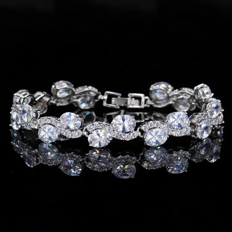 Copper gold plated bracelet with AAA+ zircon stones showing geometric design and 18.4 cm length