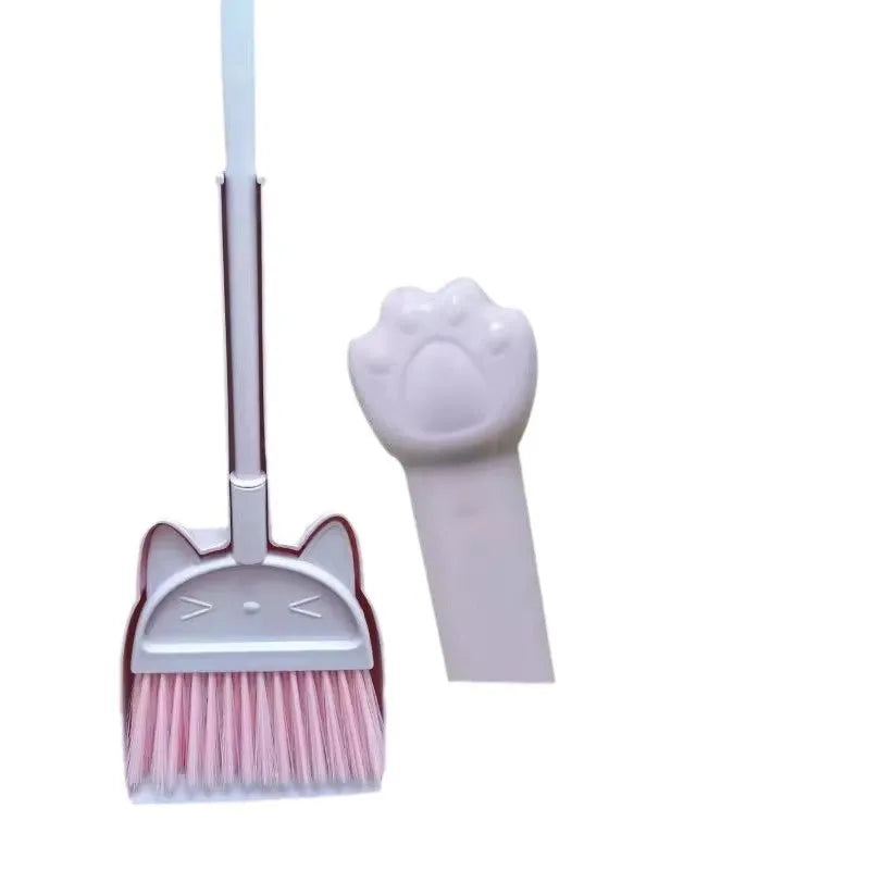 Purple broom and dustpan set with rotating brush head and integrated brush holder