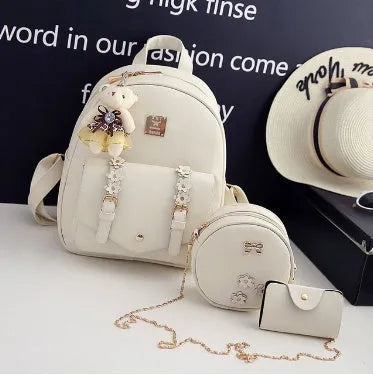 Women's three-piece floral PU leather backpack set with school backpack, shoulder bag, and card purse