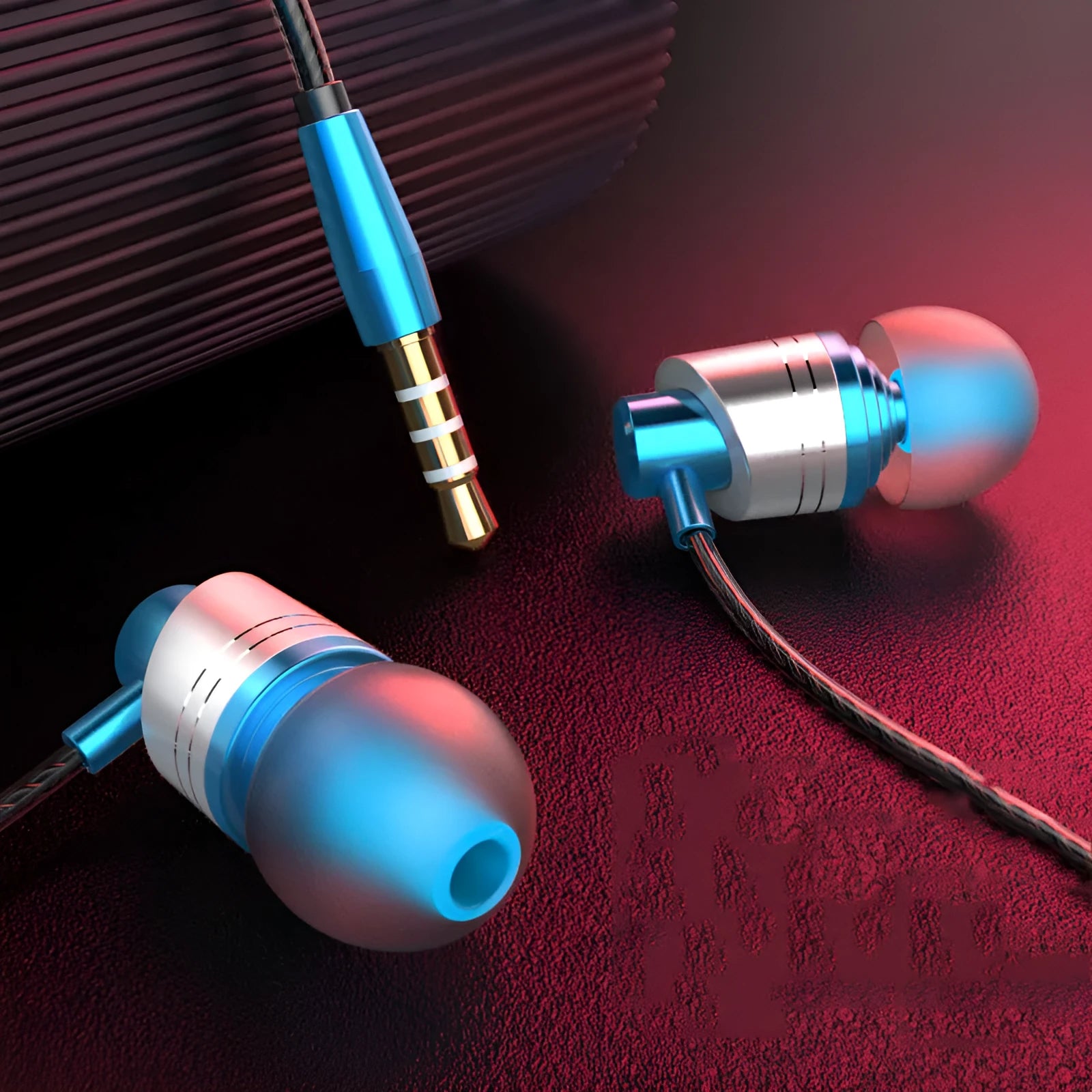Black wired in-ear headphones with a 3.5mm plug, inline microphone, and silicone ear tips.