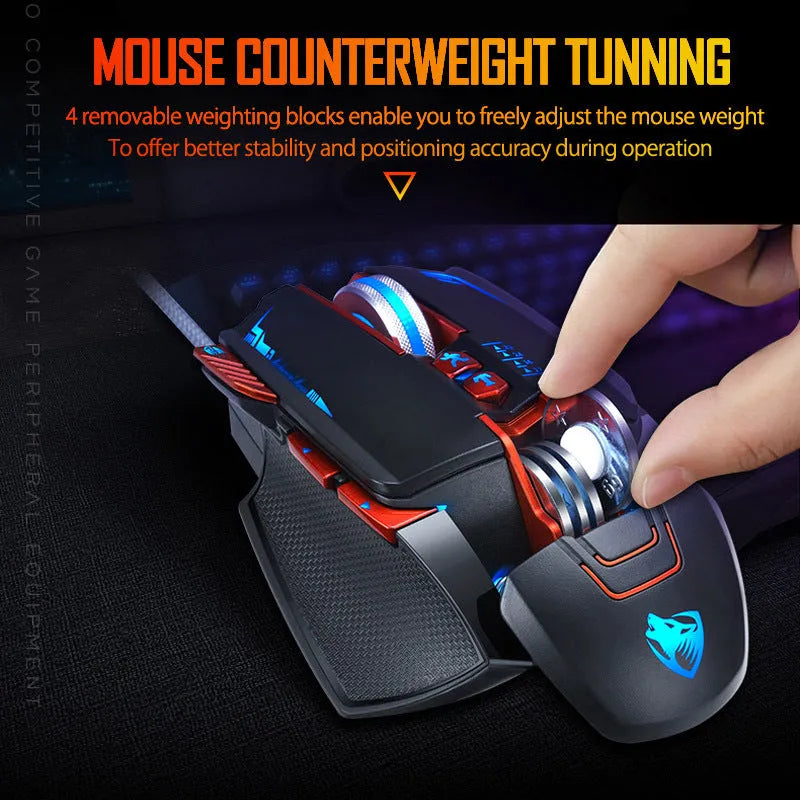 Thunder Wolf V9 black and grey wired gaming mouse with ergonomic shape on a desk.