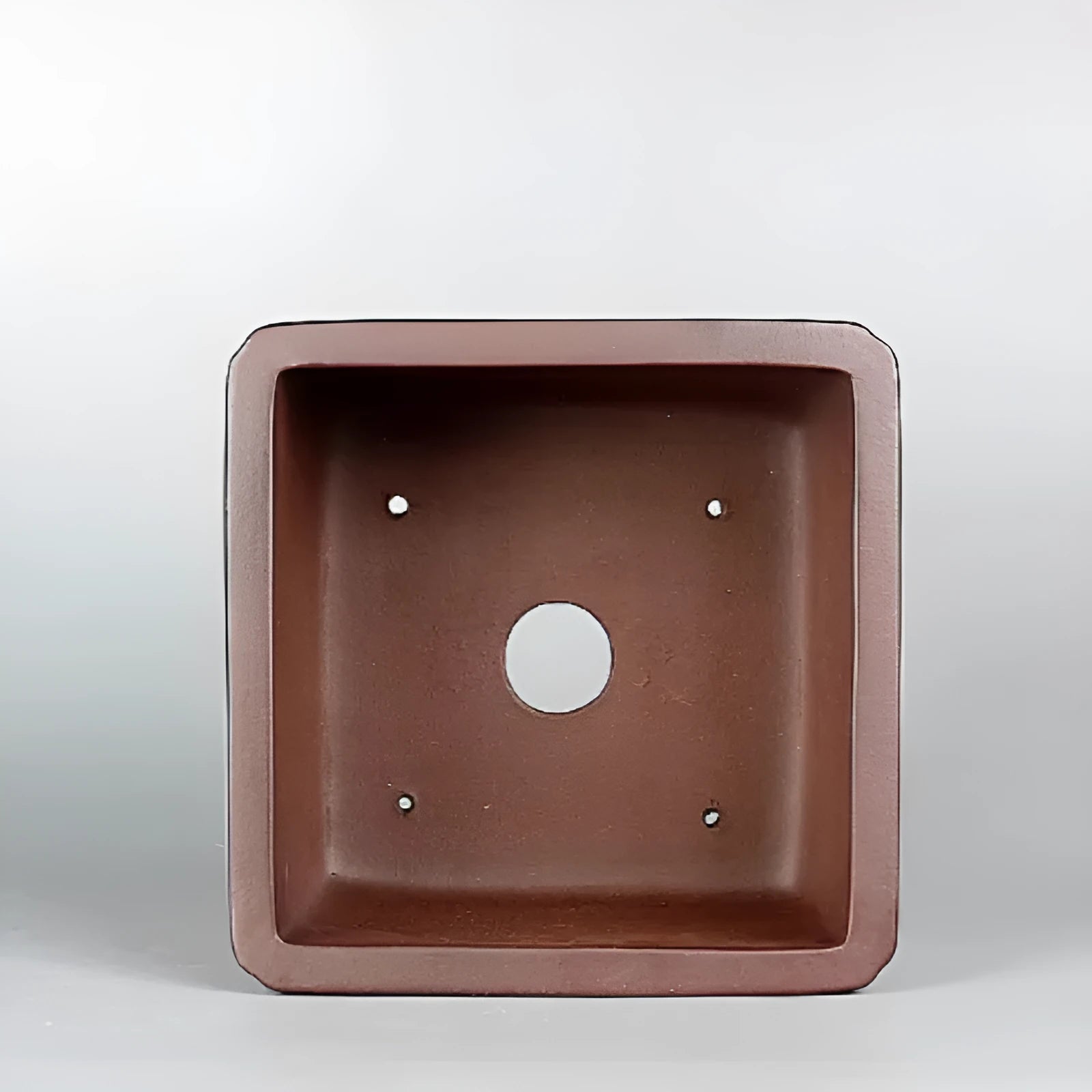 Brown handmade purple clay classical flower pot with drainage hole
