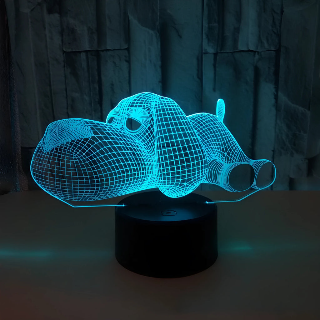 Dog-shaped desktop lamp glowing in blue with touch button and USB power cable