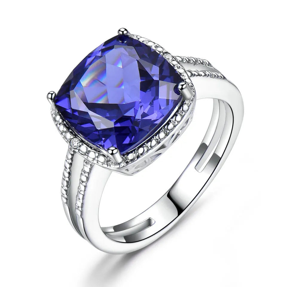 Women's sterling silver ring with a genuine blue tanzanite gemstone, shown in size 8.
