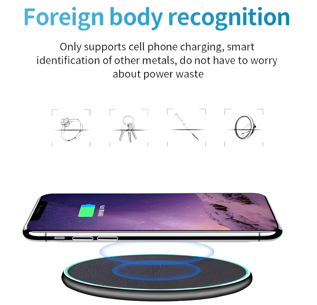 Black Qi wireless charging pad with built-in stand for iPhone 11 on a desk.