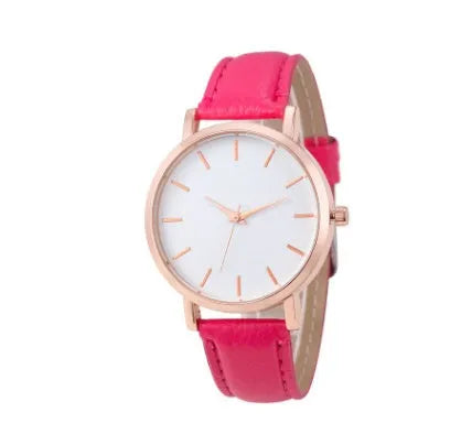 Square-faced quartz watch with an alloy case and PU leather strap on a wrist.