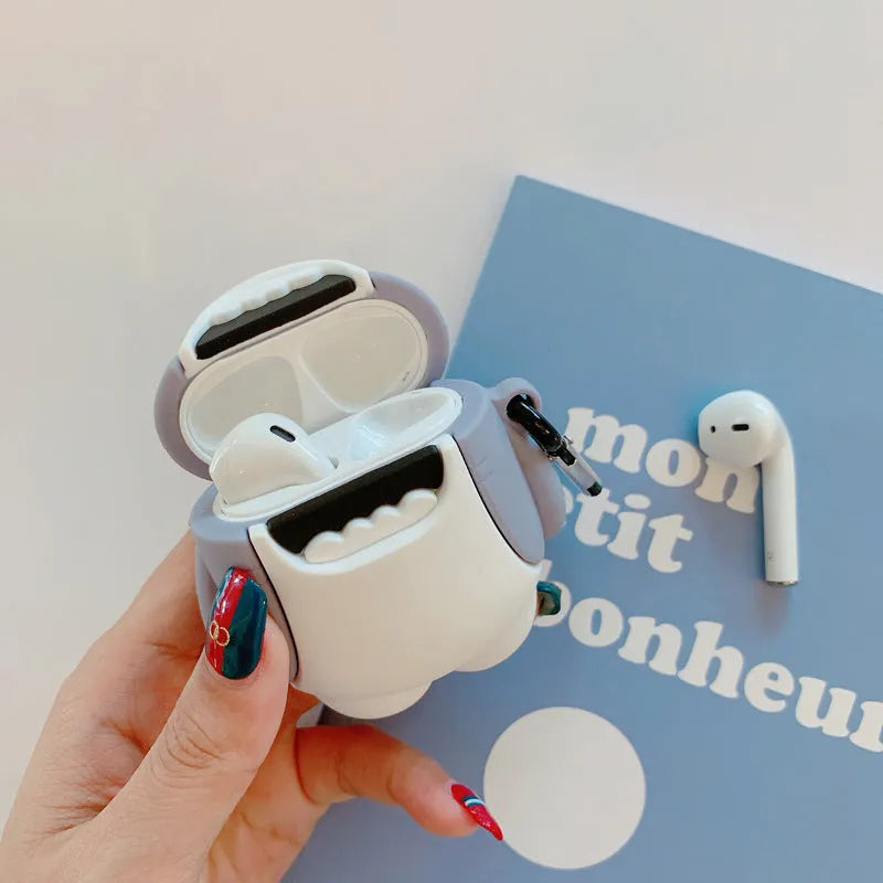 Silicone protective cover for Apple AirPods 1 and 2 charging case with clip-on shark fin decoration.