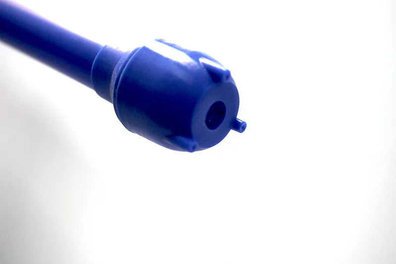 Blue and red manual hand pump for siphoning fuel and oil from containers