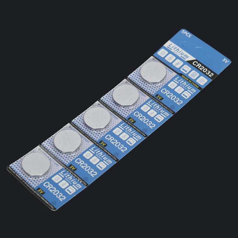 CR2032 3-volt lithium button cell battery on a card, showing its 20mm diameter and silver colour.
