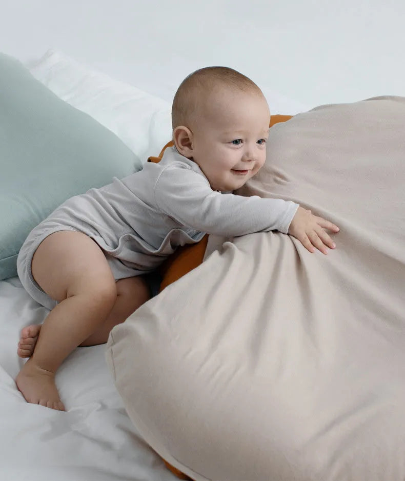 Beige portable cotton baby nest crib for newborn, measuring 75cm by 45cm.
