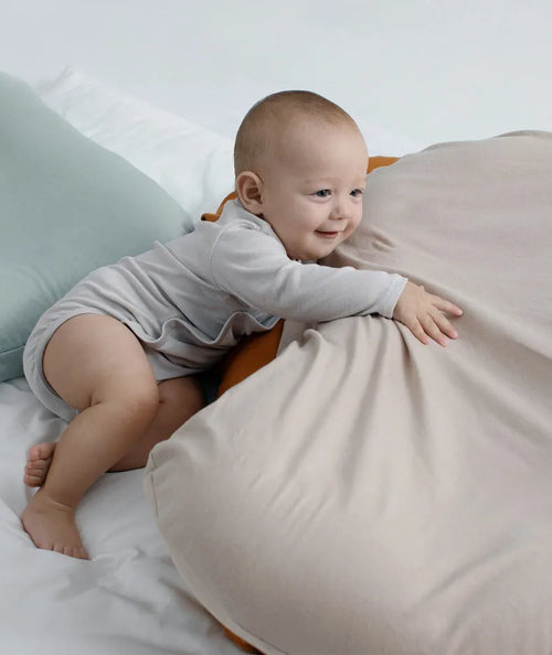 Beige portable cotton baby nest crib for newborn, measuring 75cm by 45cm.