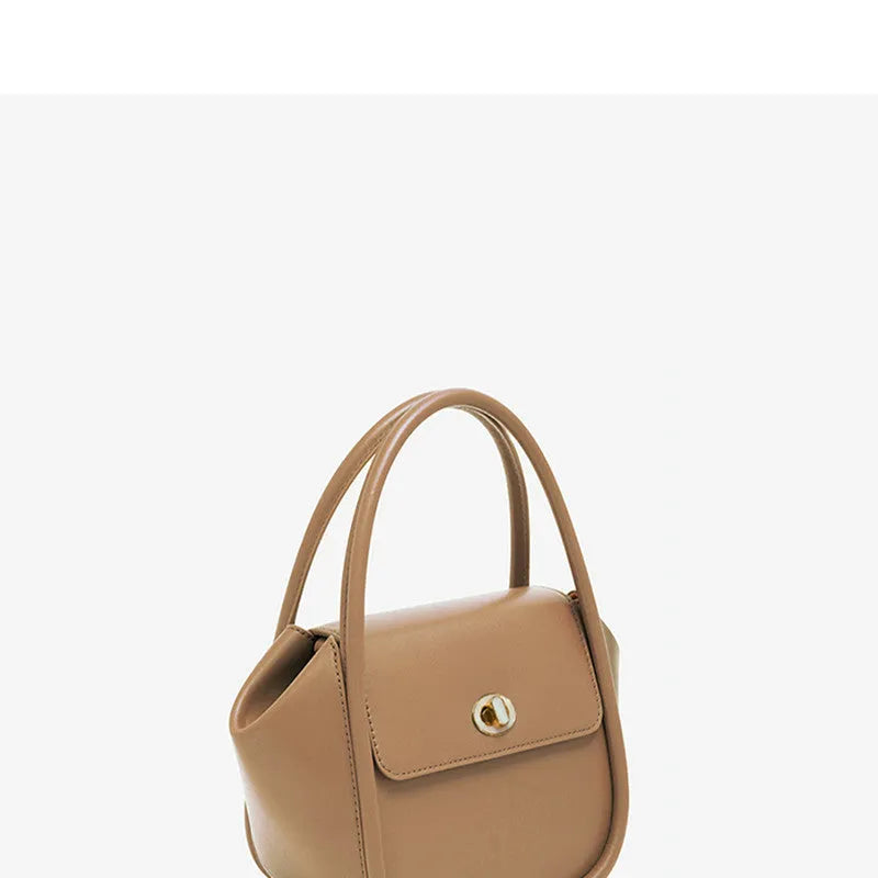 Leather wing-shaped tote cross-body bag in cow leather with single shoulder strap