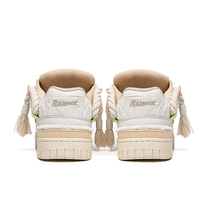 Creamy white retro low-top skateboard shoes with platform heel and lace-up front.