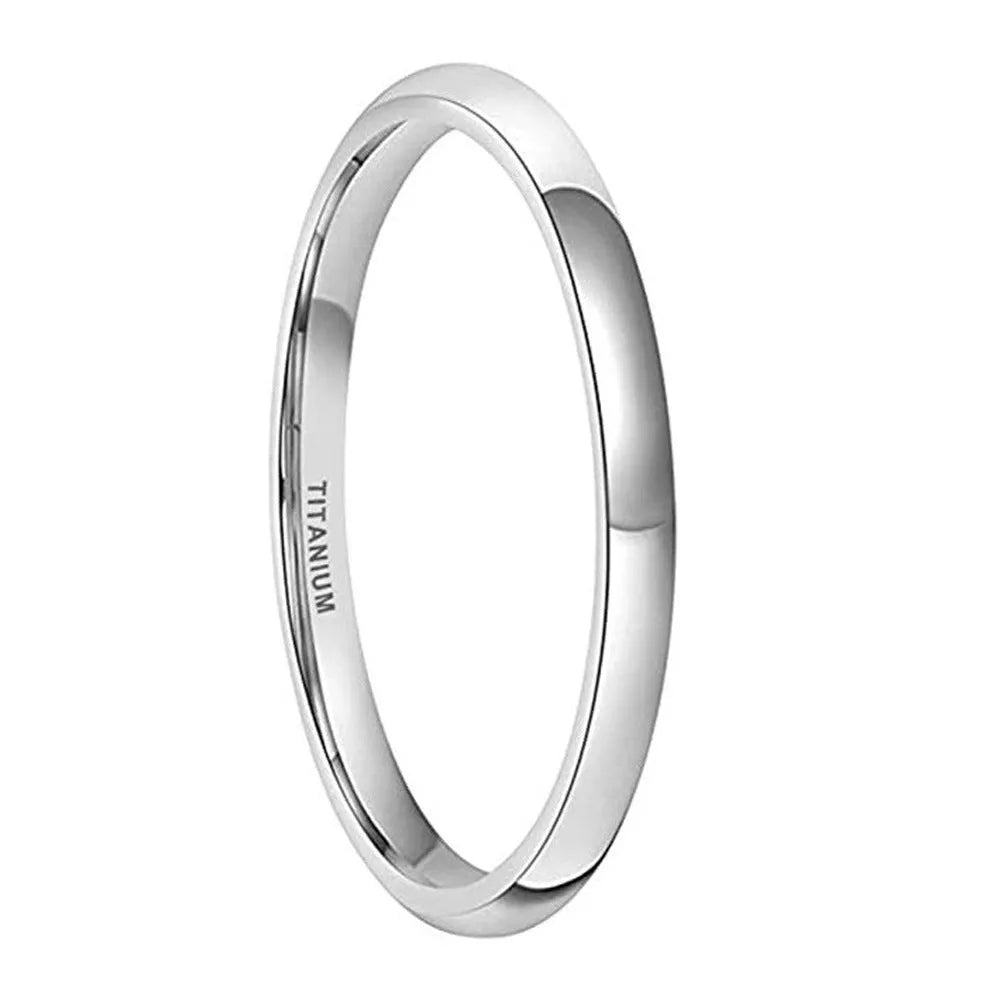 Silver titanium steel unisex ring shown in different band widths on a hand.