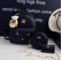 Women's three-piece floral PU leather backpack set with school backpack, shoulder bag, and card purse