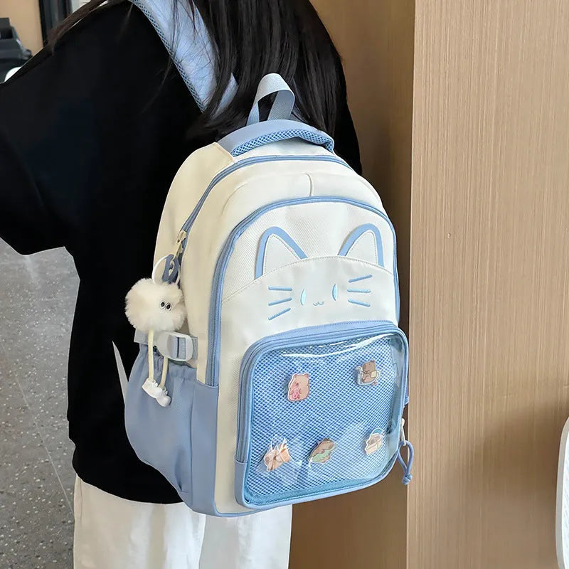 Korean cartoon animation style backpack in two sizes with curved shoulder straps.