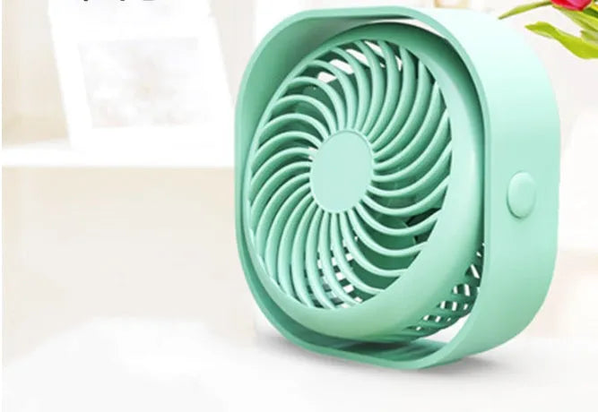 USB desk fan with alarm clock in modern simple style, showing 360-degree rotation feature.