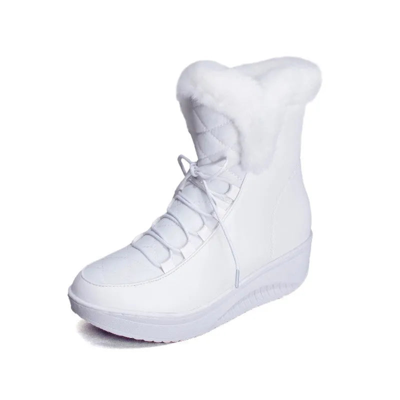 Black women's lace-up winter ankle boots with a platform sole on a white background