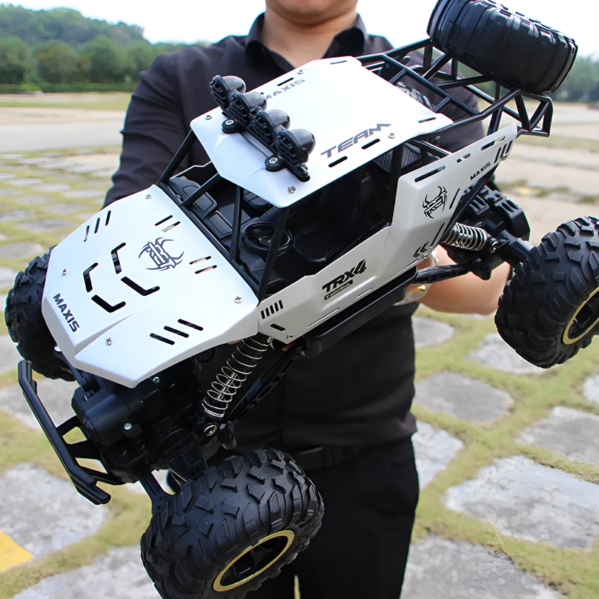 Large black 4WD off-road remote control climbing car with 2.4G wireless controller