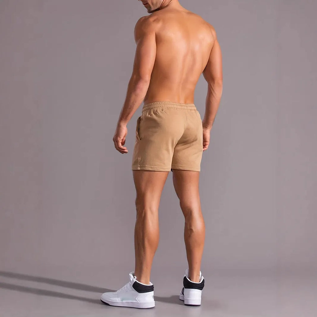 Men's khaki coconut print sports shorts with straight cut design and micro elastic polyester fabric