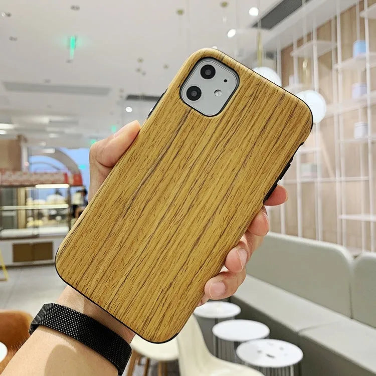 Natural wood iPhone case in back cover style showing timber grain patterns