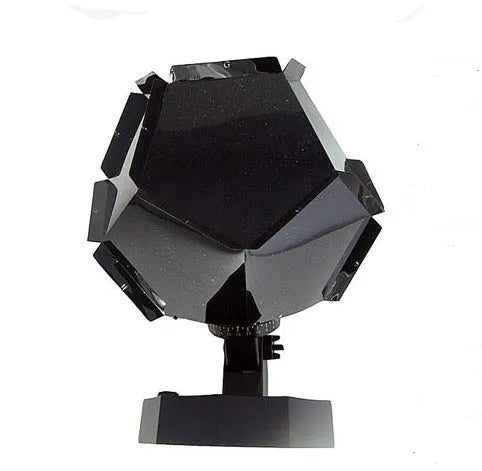 LED starry sky projector night lamp showing constellation projection on a bedroom ceiling.
