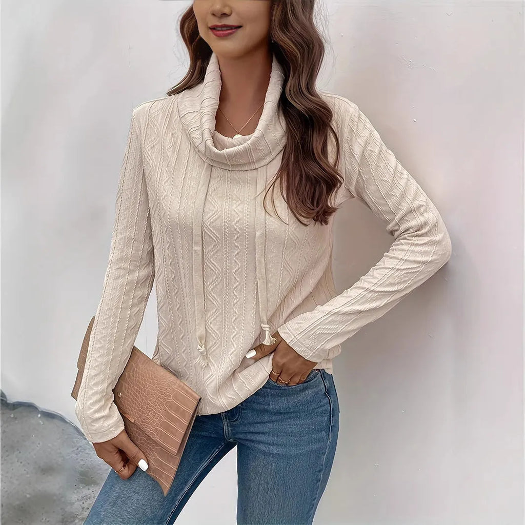 Apricot coloured hooded pullover sweater with long sleeves and drawstring