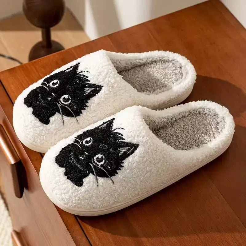 White plush slippers with Black Beard cat cartoon design for couples, showing non-slip sole.