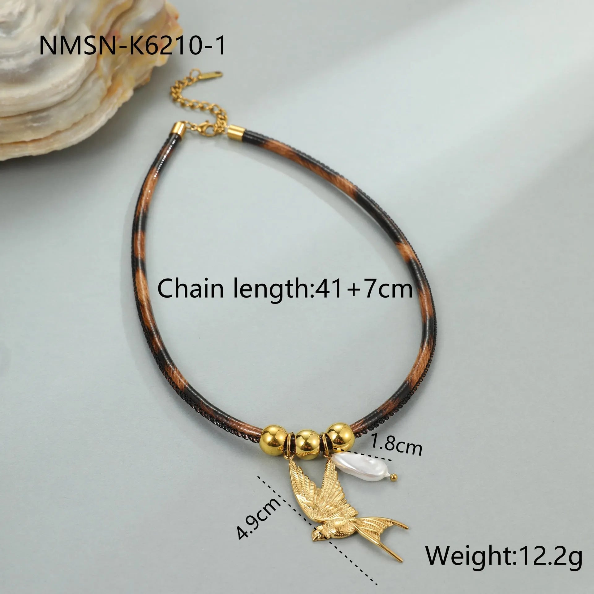 Geometric leopard pendant necklace on stainless steel chain with gold electroplated finish