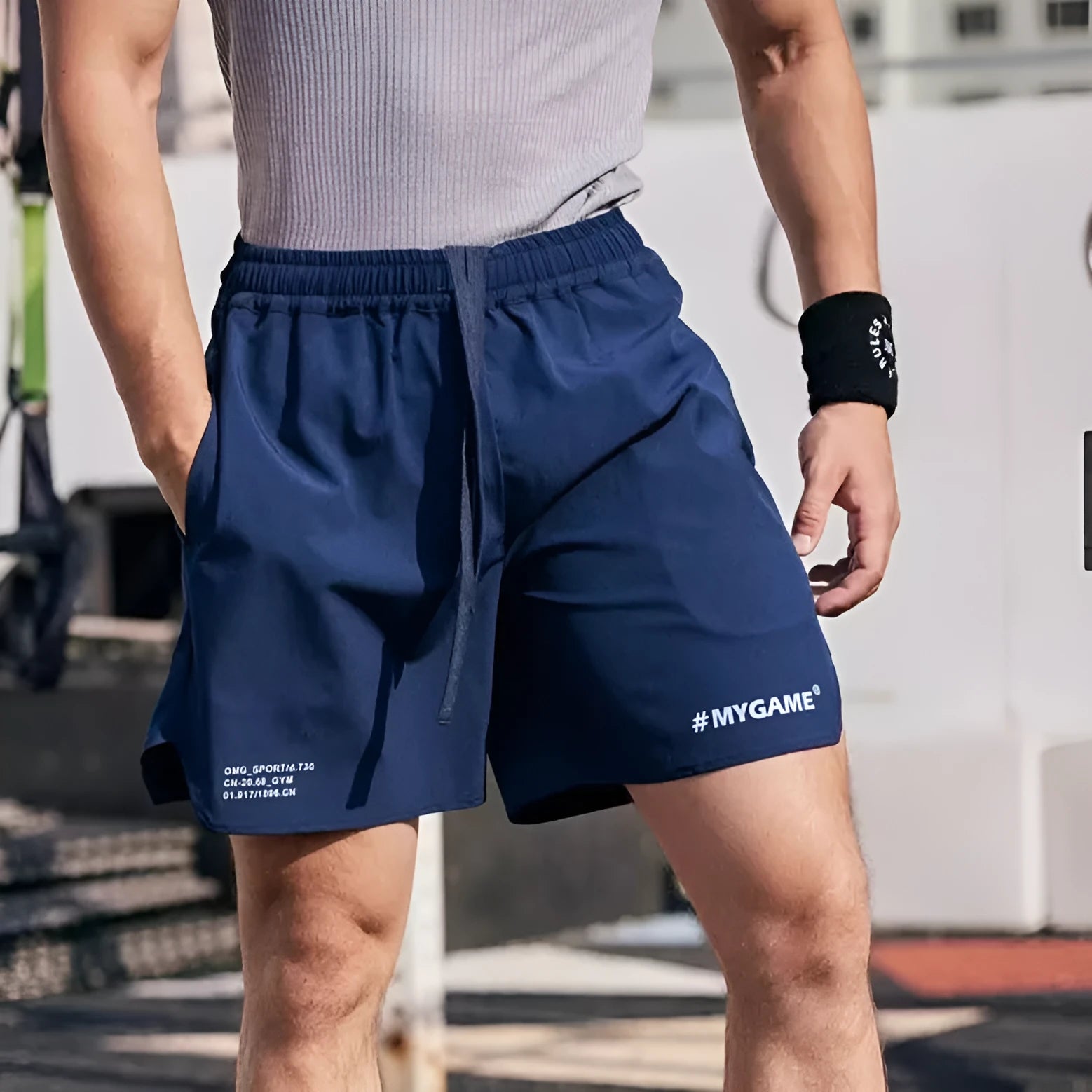 Men's grey compression fitness shorts with four-point design for summer training