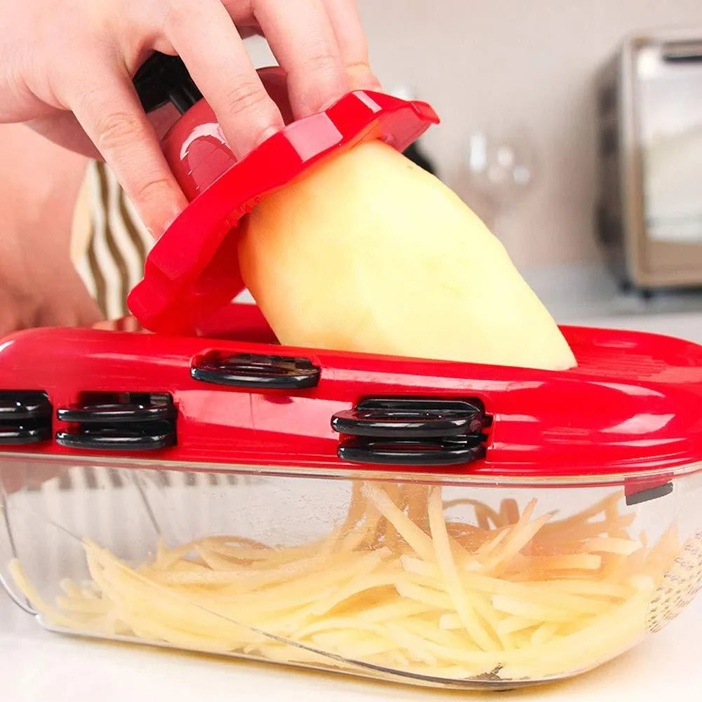 Red multi-function vegetable cutter set with stainless steel blades, plastic body, and clear container.