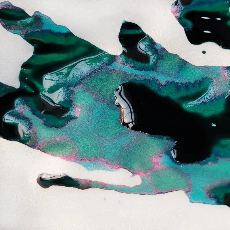 Bottle of gold sheen gradient ink for fountain pens and dip pens in Red Tide or Truffle colour.