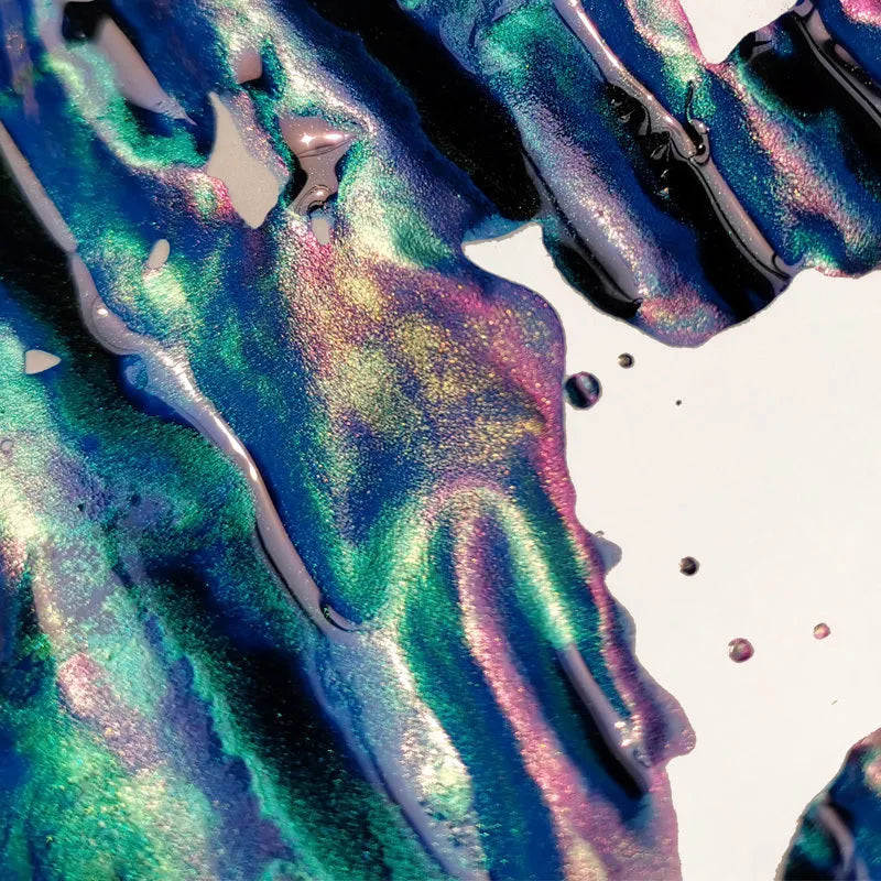 Bottle of gold sheen gradient ink for fountain pens and dip pens in Red Tide or Truffle colour.