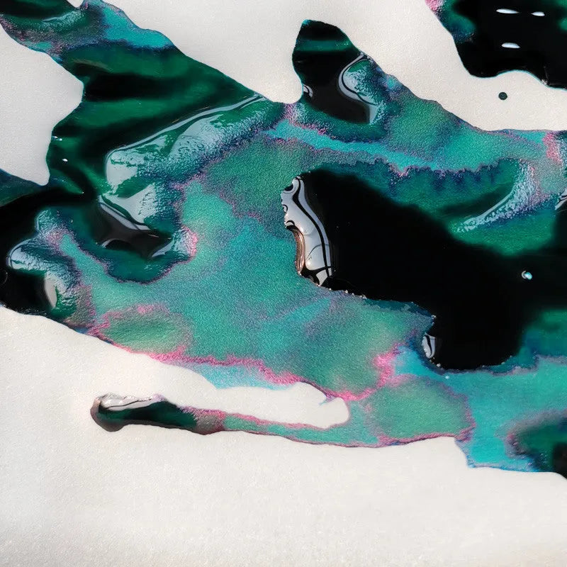 Bottle of gold sheen gradient ink for fountain pens and dip pens in Red Tide or Truffle colour.