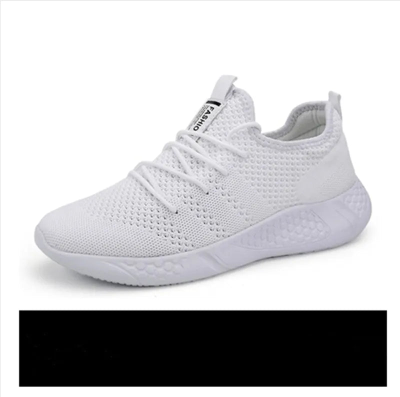 Men's black and white mesh casual sneaker with PVC sole and lace-up closure on a plain background.