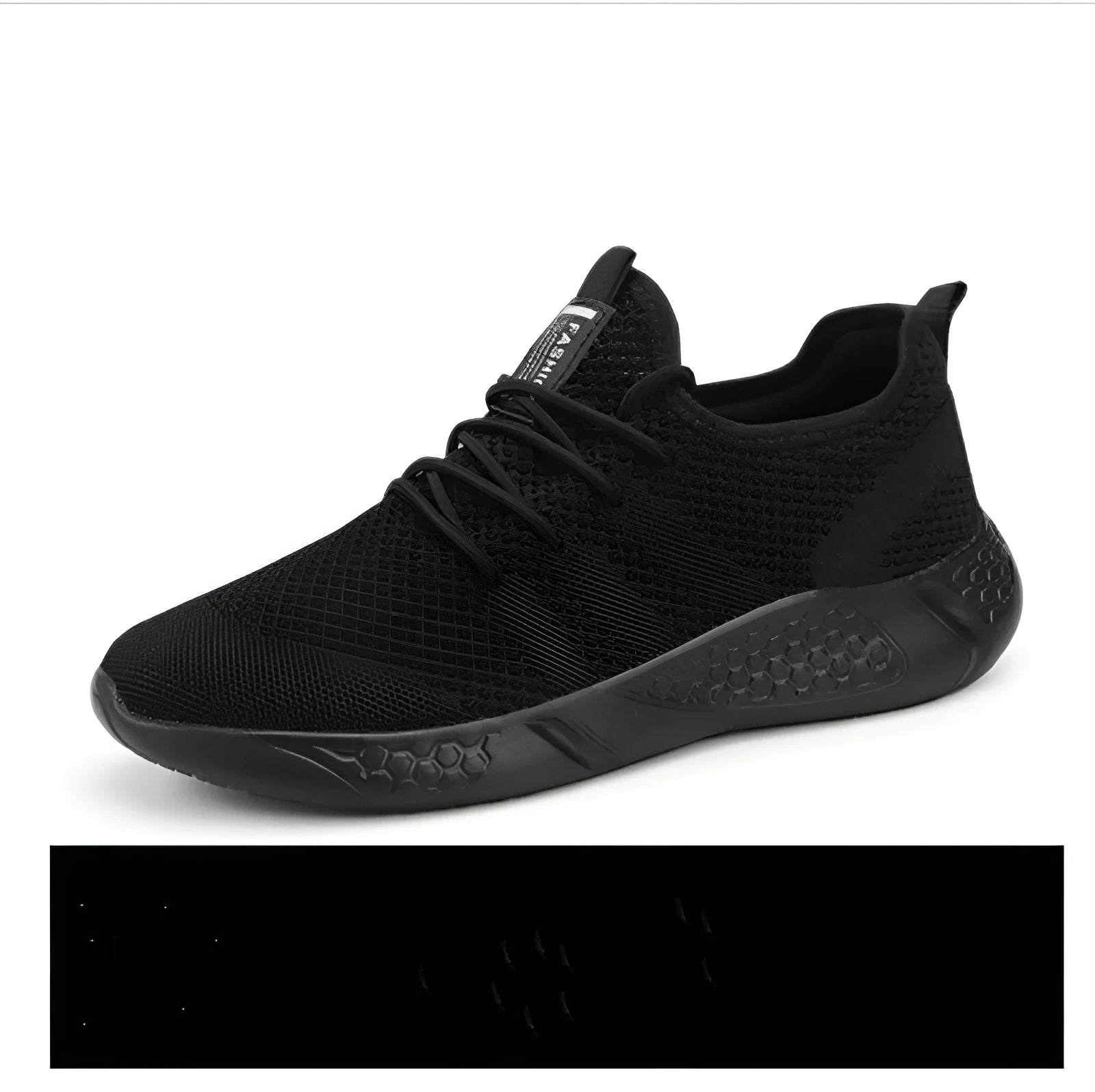 Men's black and white mesh casual sneaker with PVC sole and lace-up closure on a plain background.