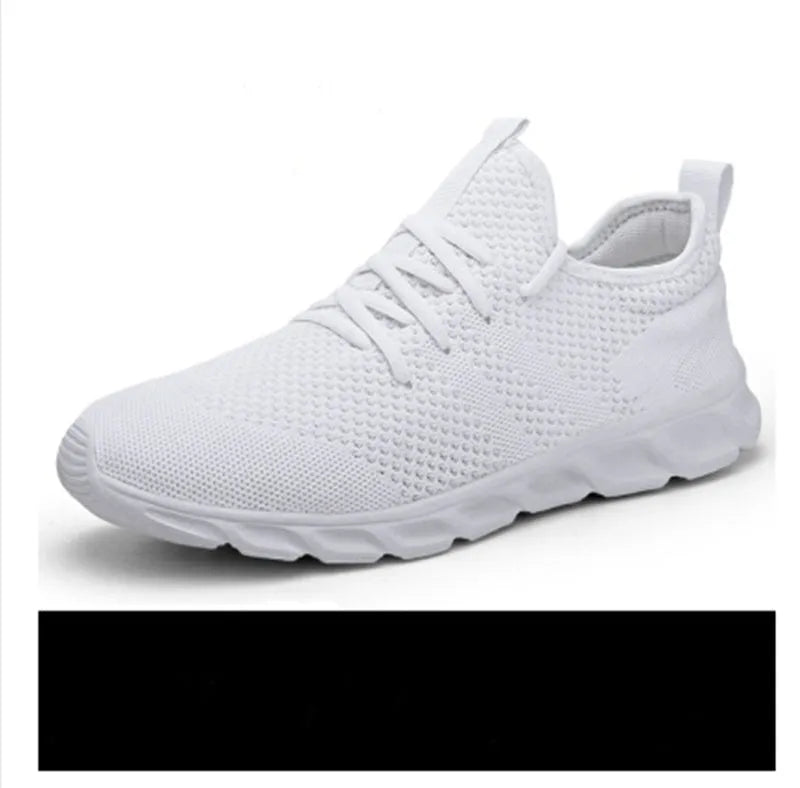 Men's black and white mesh casual sneaker with PVC sole and lace-up closure on a plain background.