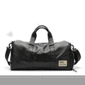 Large black waterproof PU leather sports training bag showing multiple internal organiser pockets.