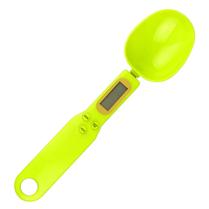 Black electronic measuring spoon scale showing digital display, 23.2cm long.