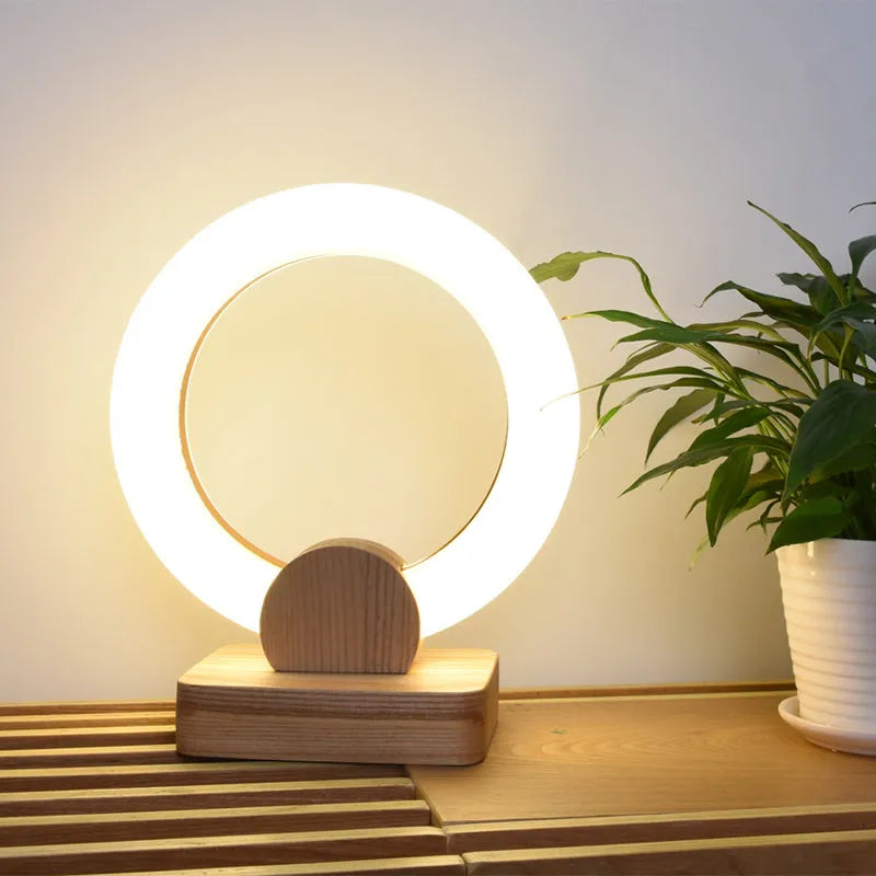 Wooden circular Nordic style chandelier with acrylic shade in living room setting