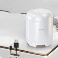 Small black or white wireless Bluetooth speaker with subwoofer body, card reader slot and USB port, 90x73x73mm size