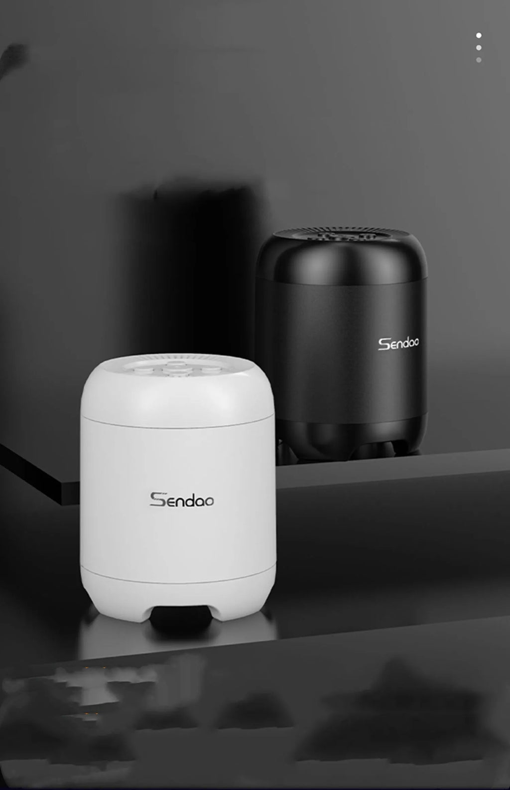 Small black or white wireless Bluetooth speaker with subwoofer body, card reader slot and USB port, 90x73x73mm size