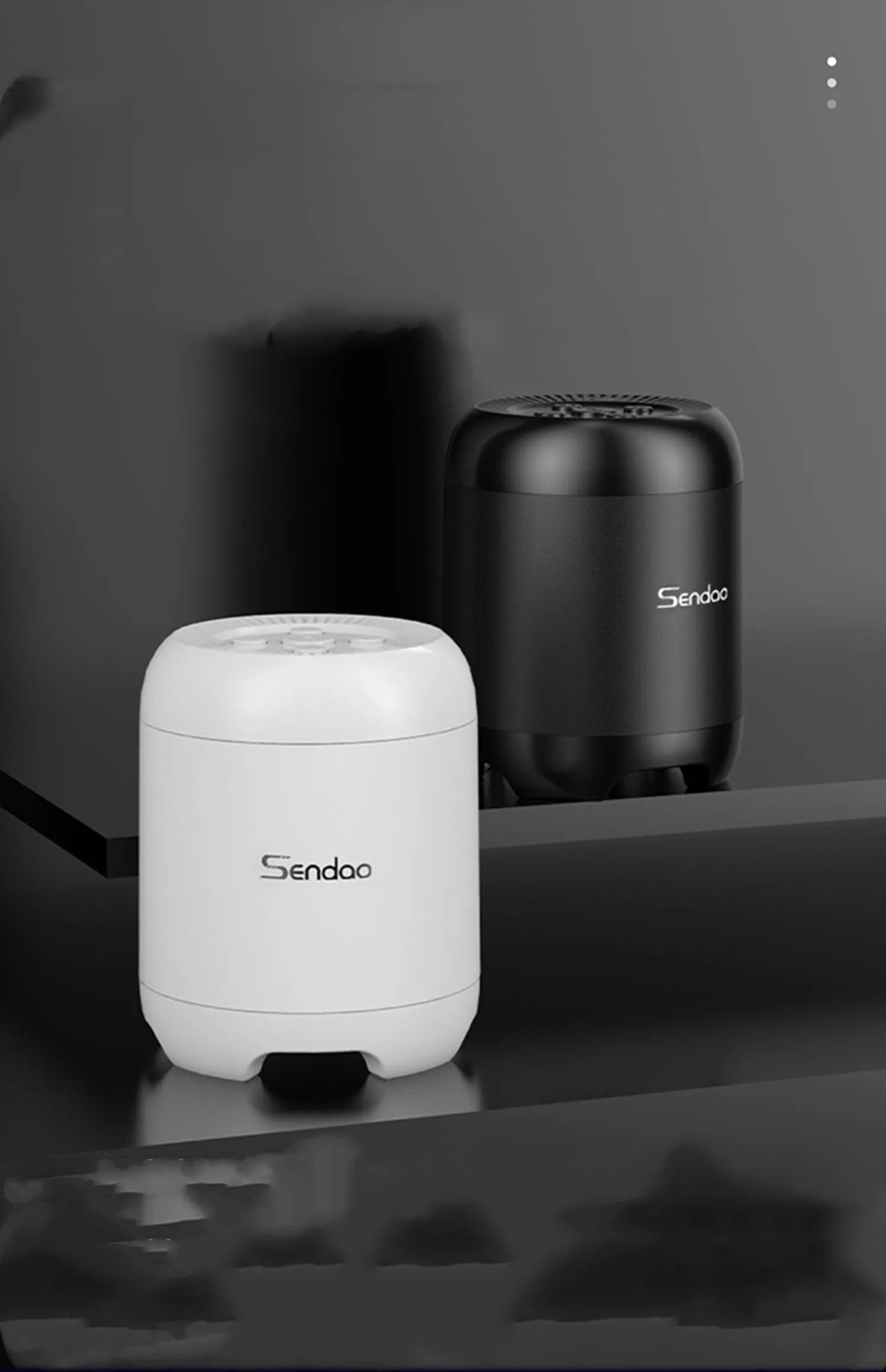 Small black or white wireless Bluetooth speaker with subwoofer body, card reader slot and USB port, 90x73x73mm size