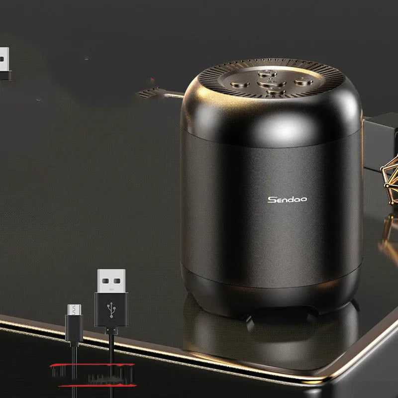 Small black or white wireless Bluetooth speaker with subwoofer body, card reader slot and USB port, 90x73x73mm size