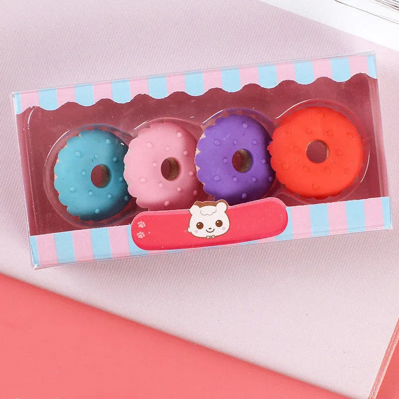 Cartoon eraser set with 12 pieces featuring ice cream, lollipop, and donut designs for kindergarten children
