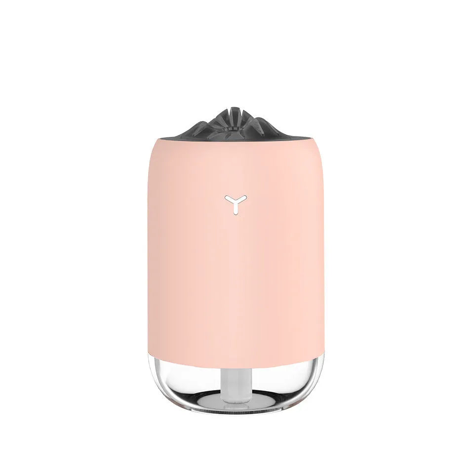 White Magic Flame ultrasonic humidifier diffuser with columnar design and single mist outlet on a desktop