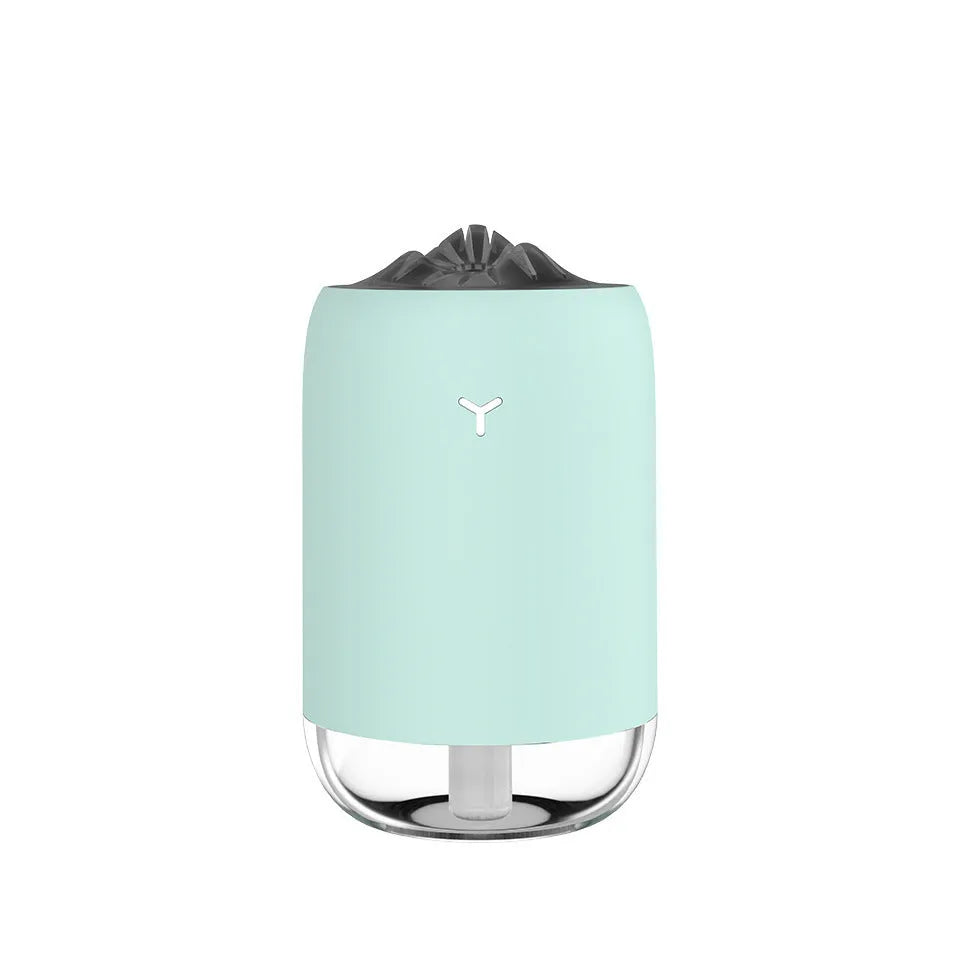 White Magic Flame ultrasonic humidifier diffuser with columnar design and single mist outlet on a desktop