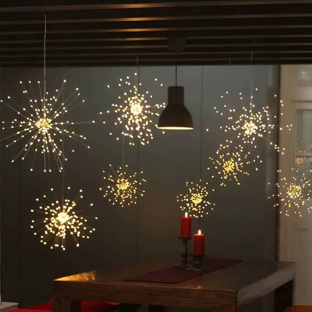 Solar-powered LED meteor shower lights hanging outdoors with warm white cascade lighting effect