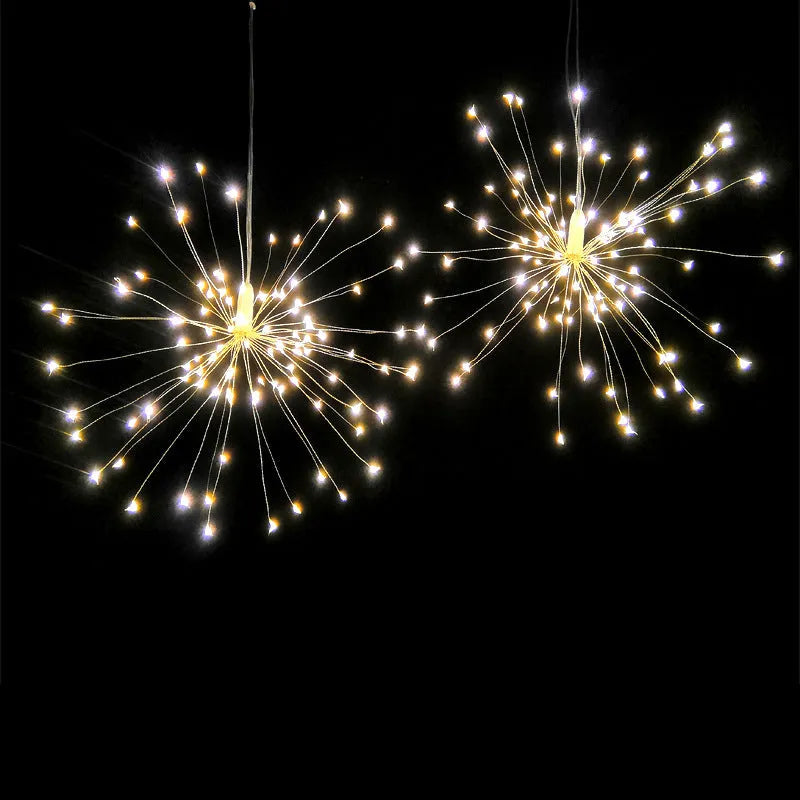 Solar-powered LED meteor shower lights hanging outdoors with warm white cascade lighting effect