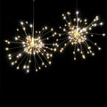 Solar-powered LED meteor shower lights hanging outdoors with warm white cascade lighting effect